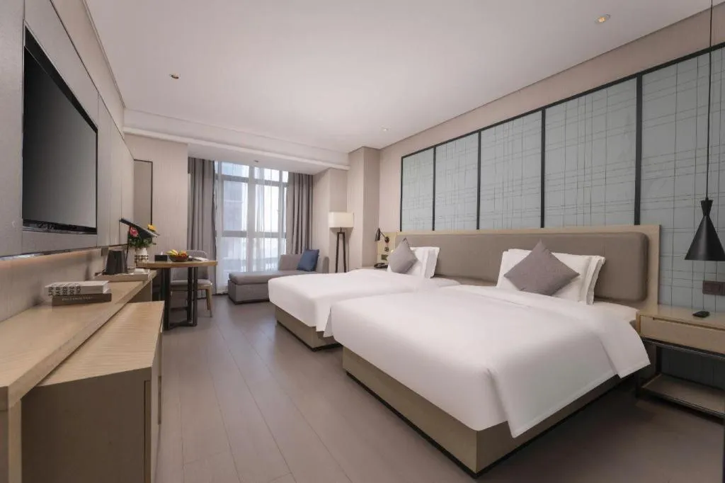 Bed in Echarm Hotel Wuxi Zhongnan Road Ancient Canal