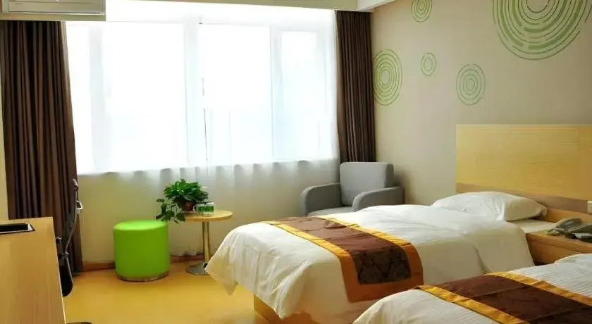Bed in GreenTree Inn Liaocheng Donge Culture Street Express Hotel Bed in GreenTree Inn Liaocheng Donge Culture Street Express Hotel