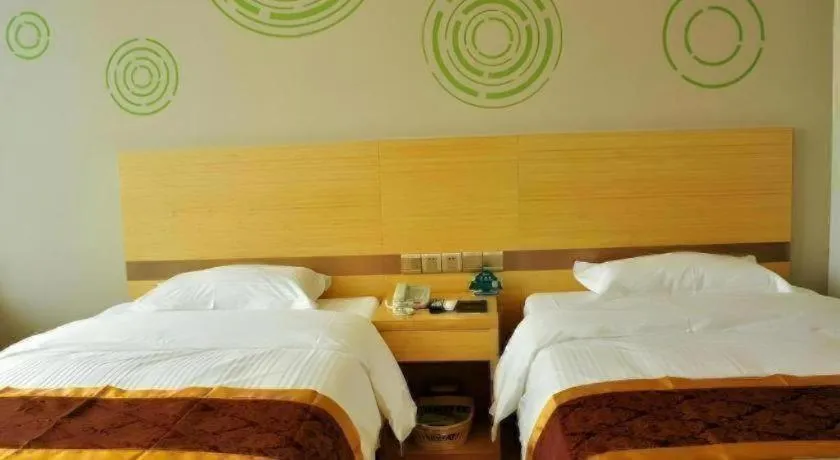 Bed in GreenTree Inn Liaocheng Donge Culture Street Express Hotel
