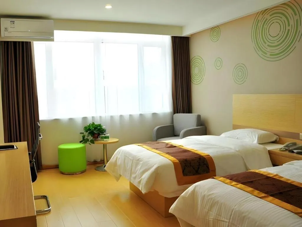 Bed in GreenTree Inn Liaocheng Donge Culture Street Express Hotel