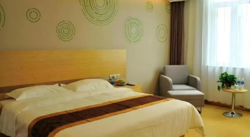 Bed in GreenTree Inn Liaocheng Donge Culture Street Express Hotel