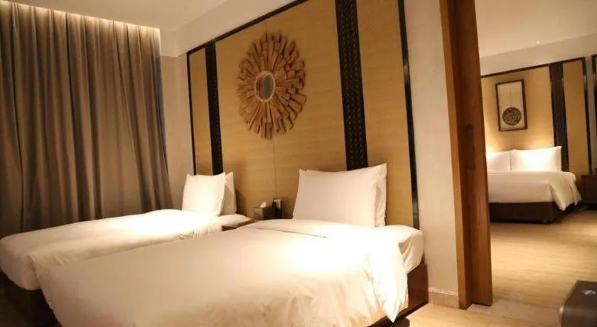 Bed in La Fountain Hotel & Resort Sanya