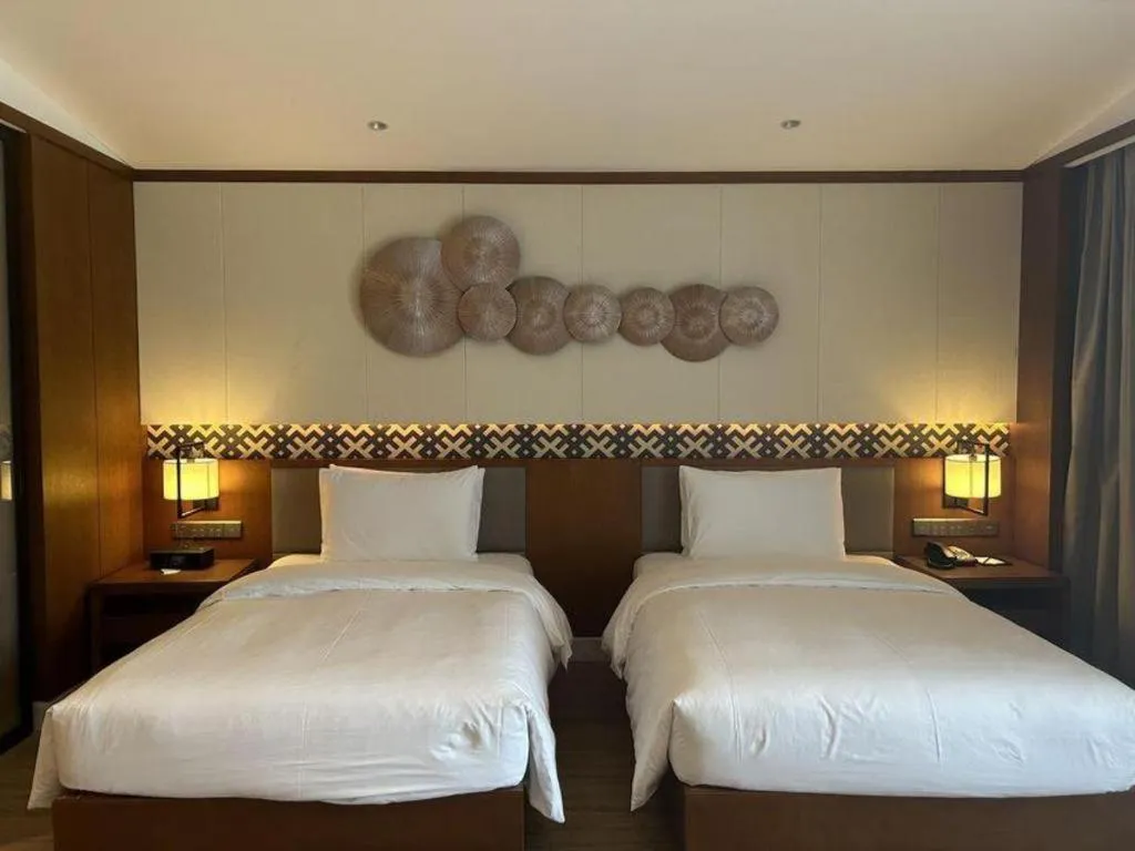 Bed in La Fountain Hotel & Resort Sanya