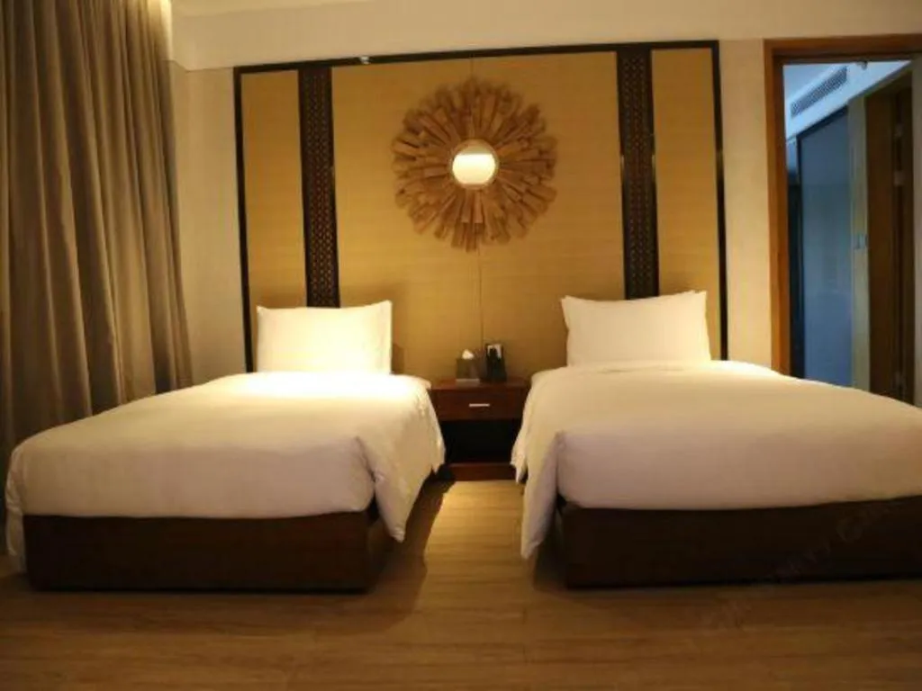 Bed in La Fountain Hotel & Resort Sanya