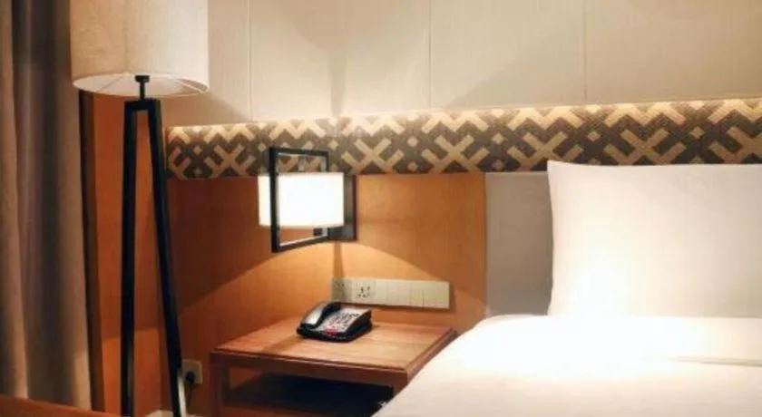 Bed in La Fountain Hotel & Resort Sanya