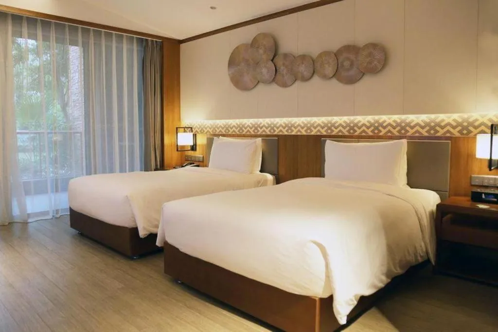 Bed in La Fountain Hotel & Resort Sanya