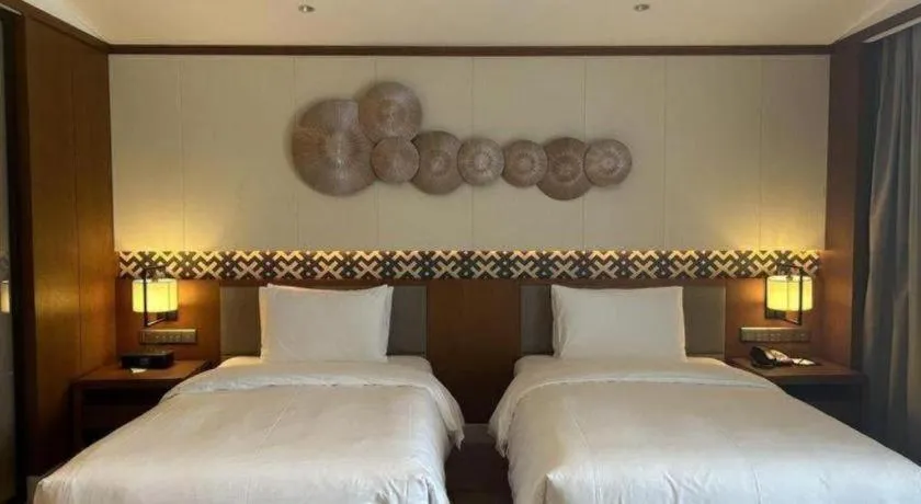 Bed in La Fountain Hotel & Resort Sanya