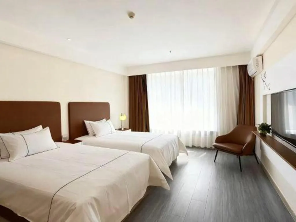 Bed in Magnotel Hotel Huizhou South Station Branch