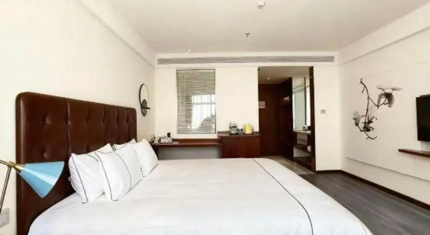 Bed in Magnotel Hotel Huizhou South Station Branch
