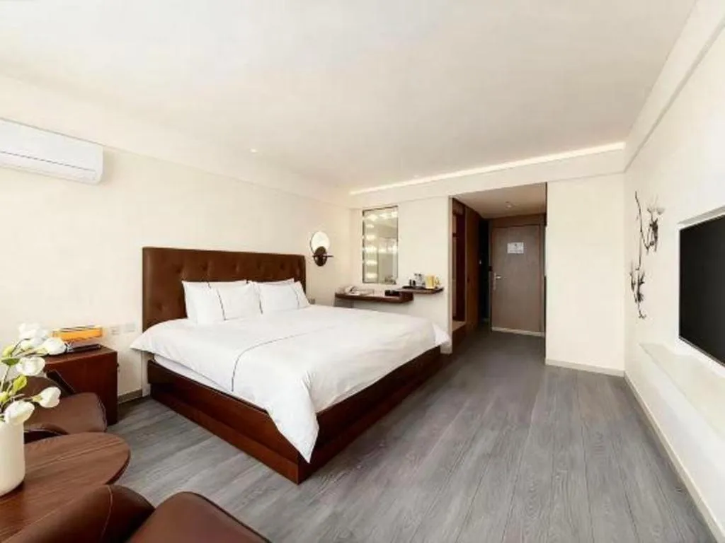 Bed in Magnotel Hotel Huizhou South Station Branch