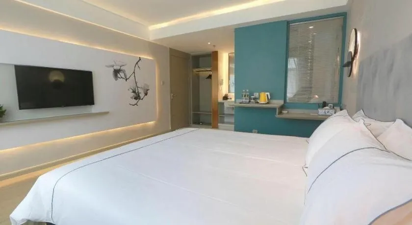 Bed in Magnotel Hotel Huizhou South Station Branch