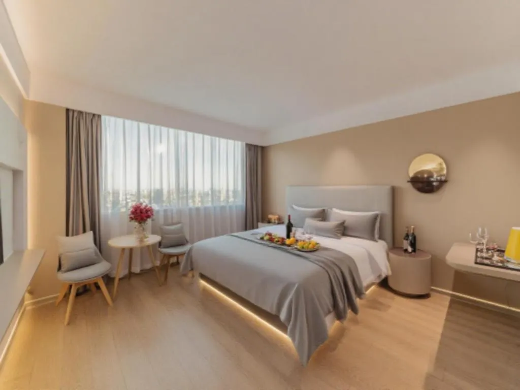 Bed in Magnotel Hotel Huizhou South Station Branch