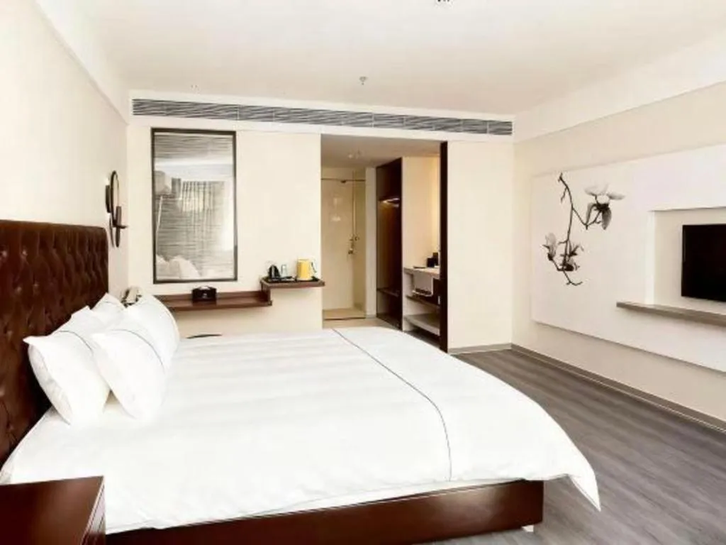 Bed in Magnotel Hotel Huizhou South Station Branch