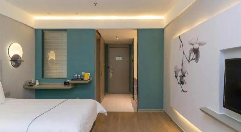 Bed in Magnotel Hotel Huizhou South Station Branch