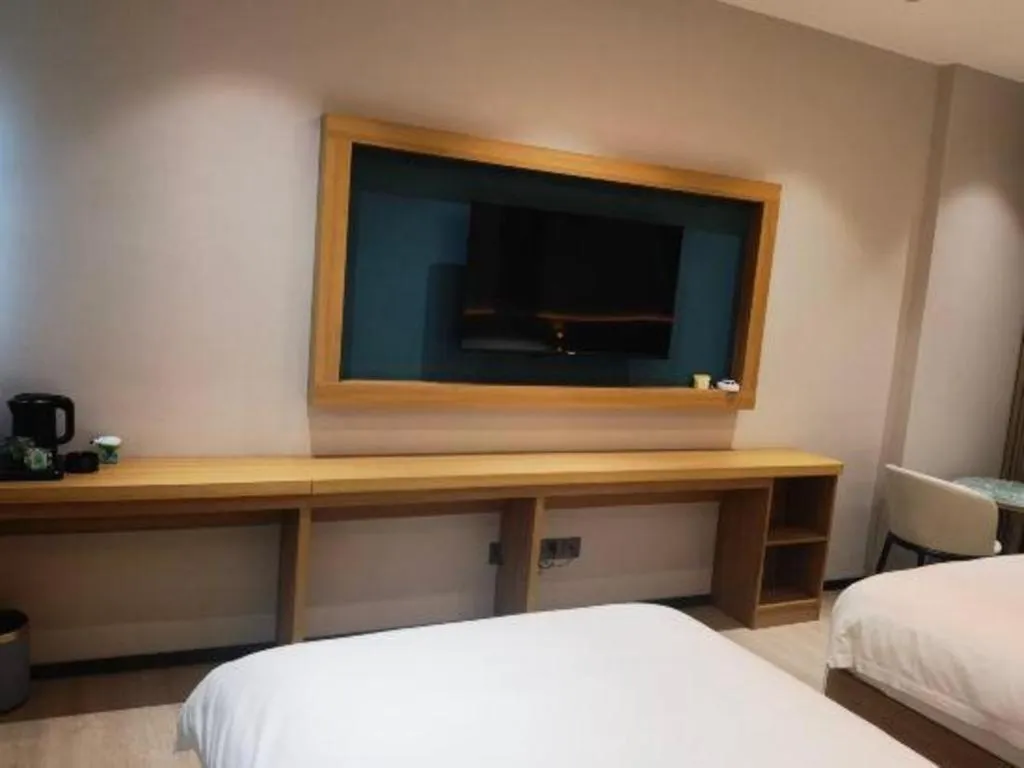 Bed in Magnotel Hotel Huizhou South Station Branch