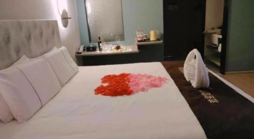 Bed in Magnotel Hotel Huizhou South Station Branch