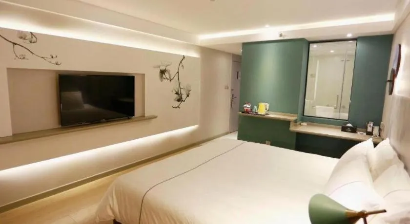 Bed in Magnotel Hotel Huizhou South Station Branch