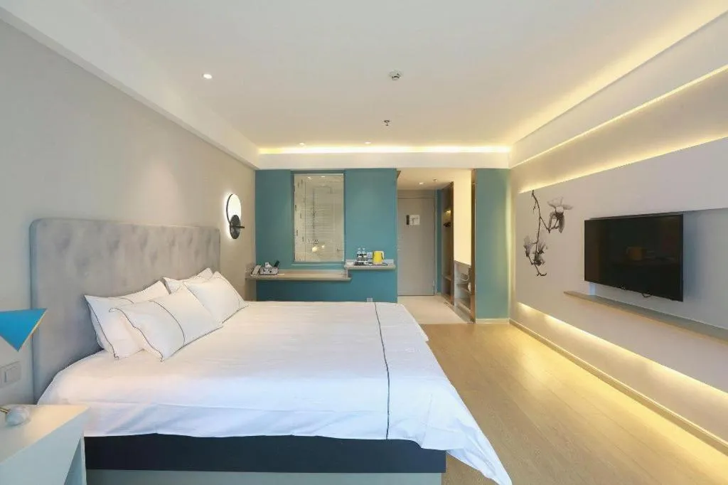 Bed in Magnotel Hotel Huizhou South Station Branch