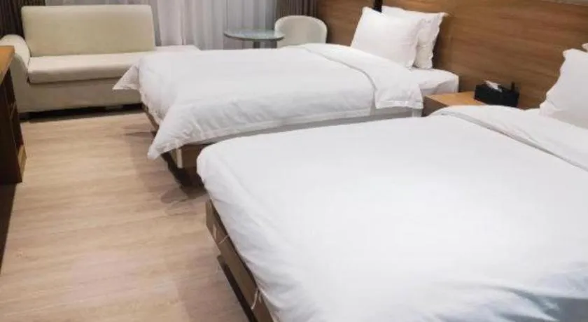 Bed in Magnotel Hotel Huizhou South Station Branch