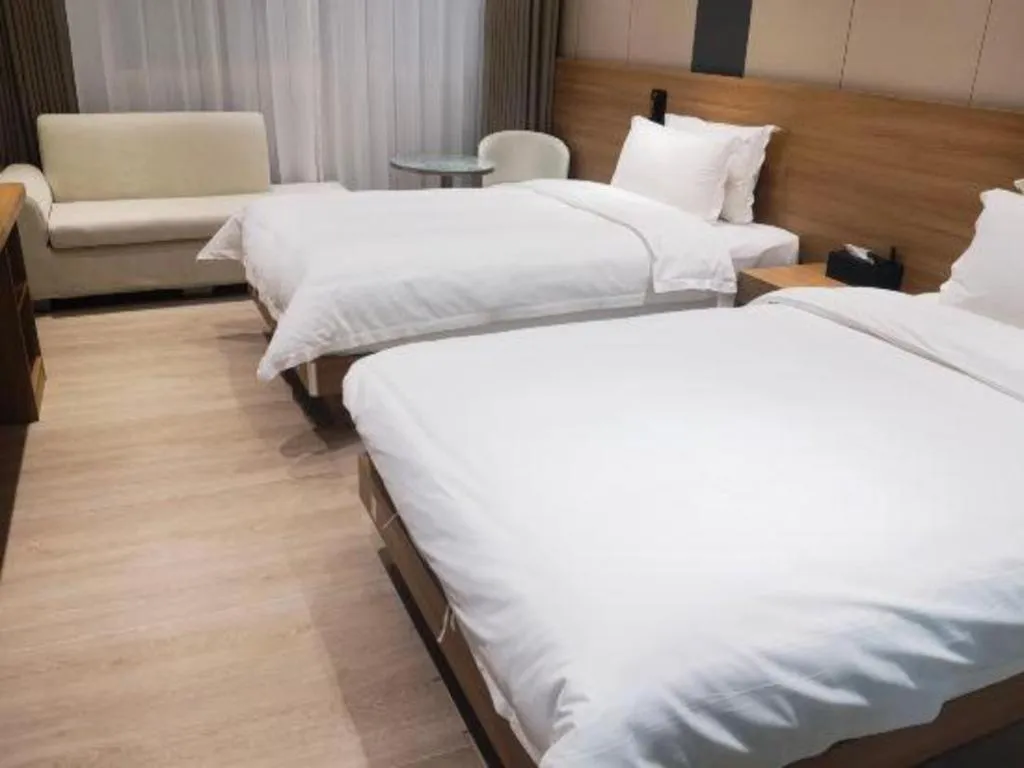 Bed in Magnotel Hotel Huizhou South Station Branch