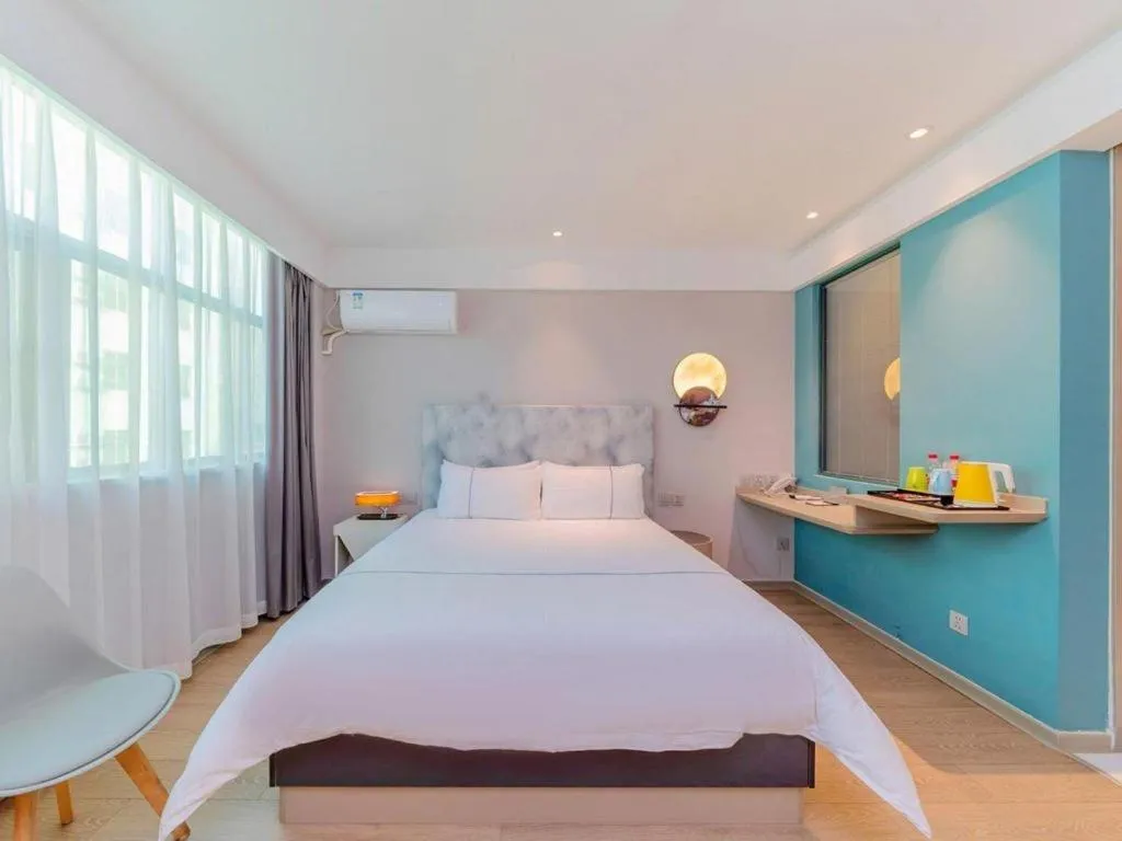 Bed in Magnotel Hotel Huizhou South Station Branch