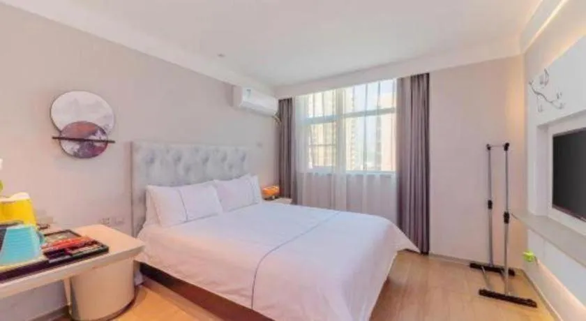 Bed in Magnotel Hotel Huizhou South Station Branch