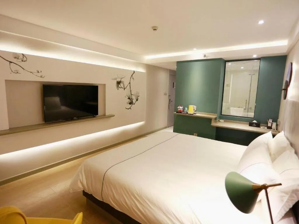 Bed in Magnotel Hotel Huizhou South Station Branch
