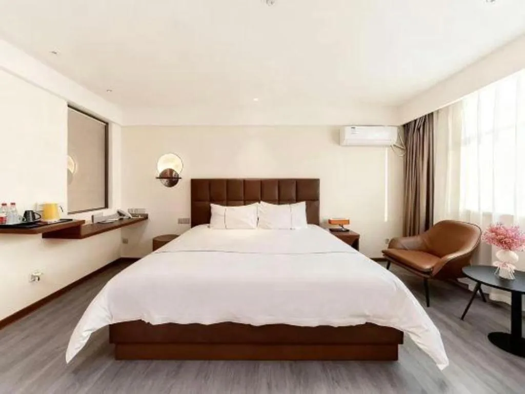 Bed in Magnotel Hotel Huizhou South Station Branch