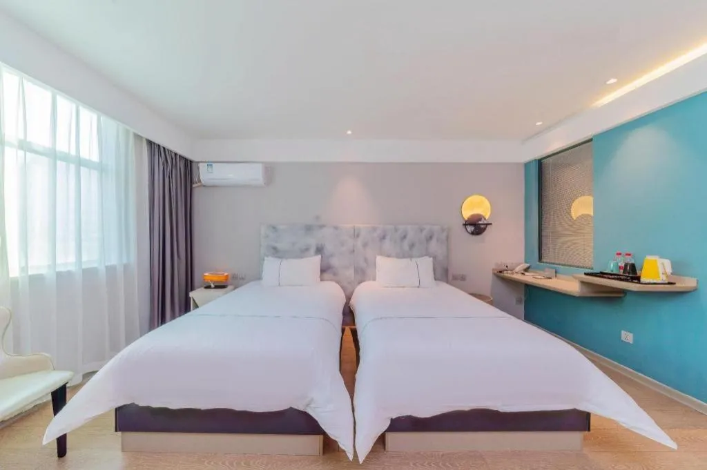 Bed in Magnotel Hotel Huizhou South Station Branch