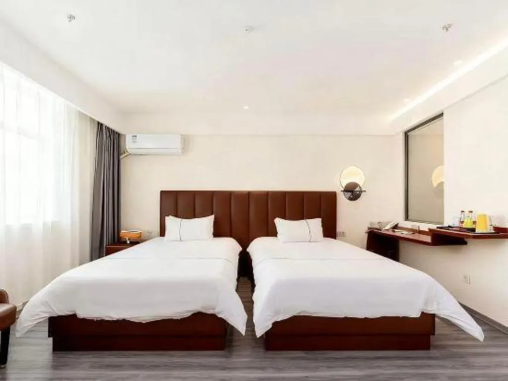 Bed in Magnotel Hotel Huizhou South Station Branch