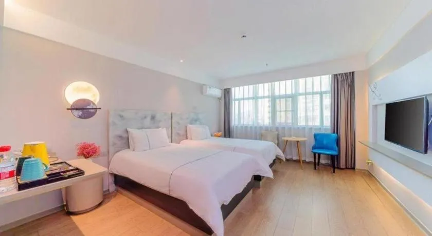 Bed in Magnotel Hotel Huizhou South Station Branch