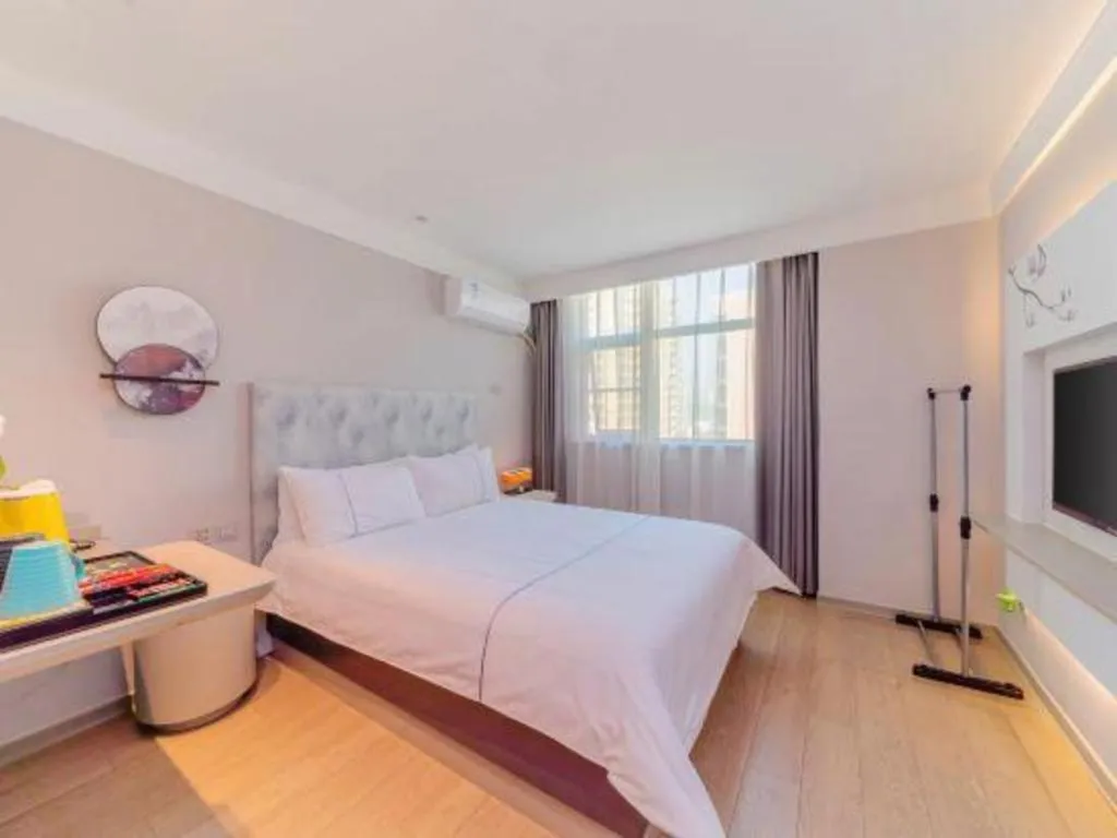 Bed in Magnotel Hotel Huizhou South Station Branch