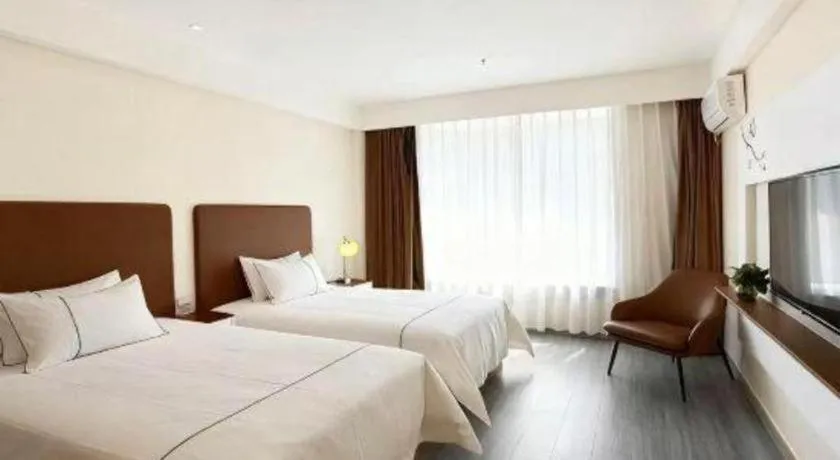 Bed in Magnotel Hotel Huizhou South Station Branch