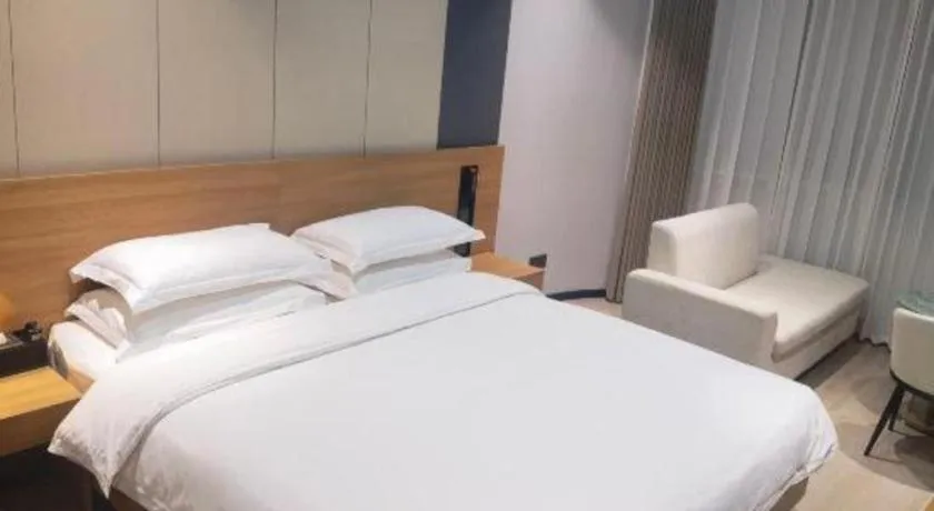 Bed in Magnotel Hotel Huizhou South Station Branch