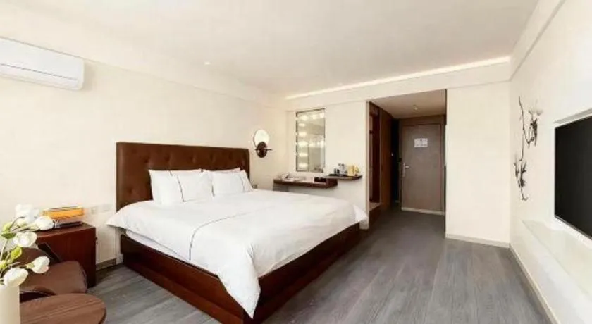 Bed in Magnotel Hotel Huizhou South Station Branch