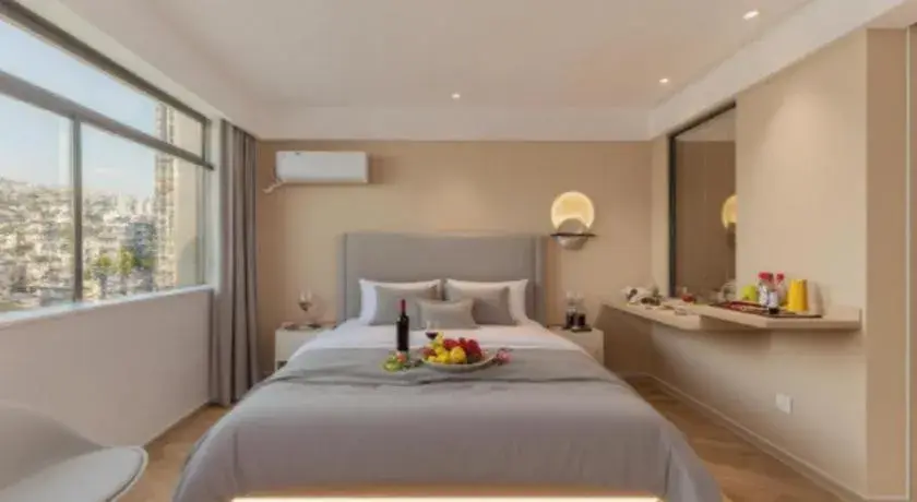 Bed in Magnotel Hotel Huizhou South Station Branch Bed in Magnotel Hotel Huizhou South Station Branch