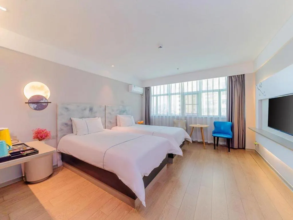 Bed in Magnotel Hotel Huizhou South Station Branch