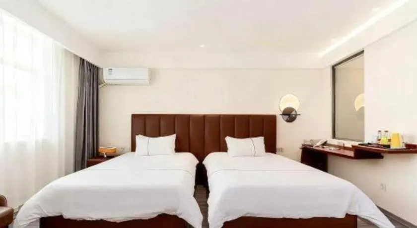 Bed in Magnotel Hotel Huizhou South Station Branch