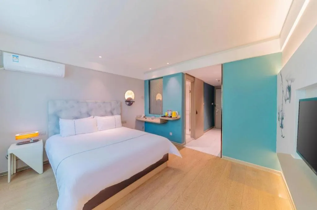 Bed in Magnotel Hotel Huizhou South Station Branch