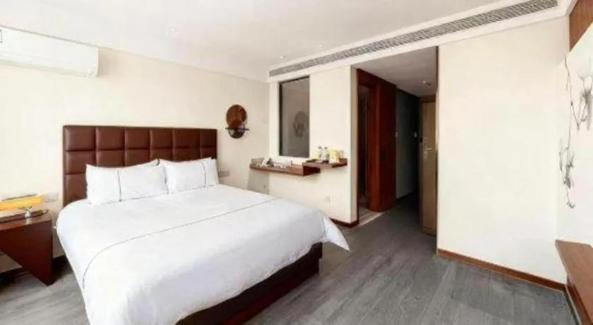 Bed in Magnotel Hotel Huizhou South Station Branch