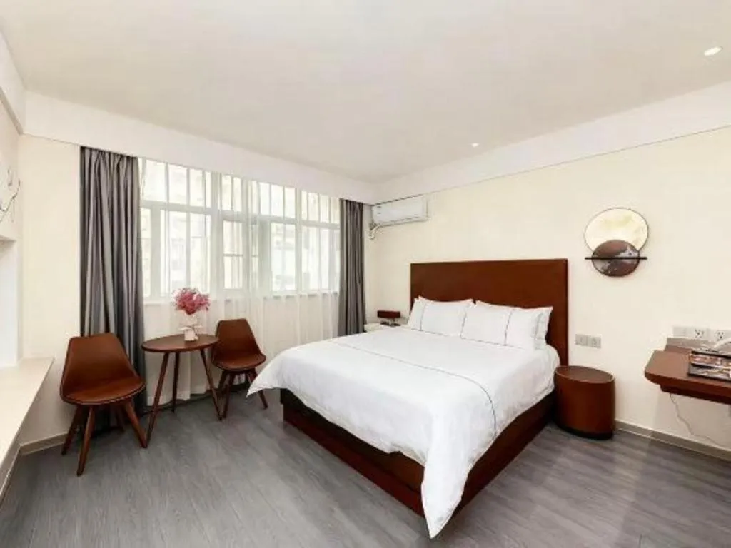 Bed in Magnotel Hotel Huizhou South Station Branch