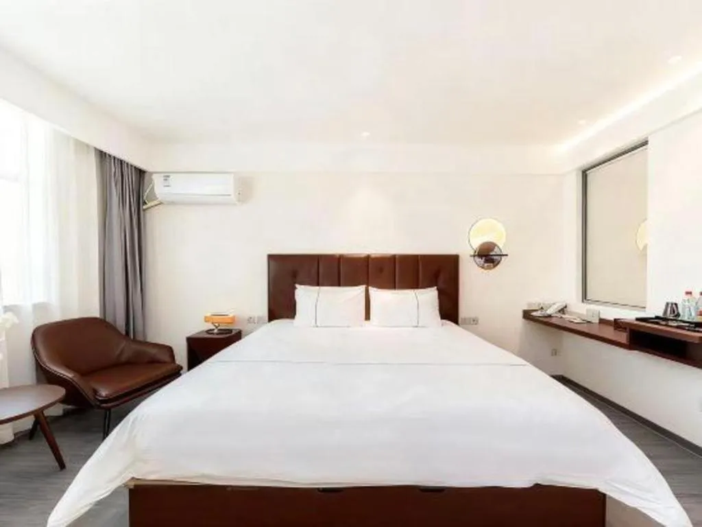 Bed in Magnotel Hotel Huizhou South Station Branch