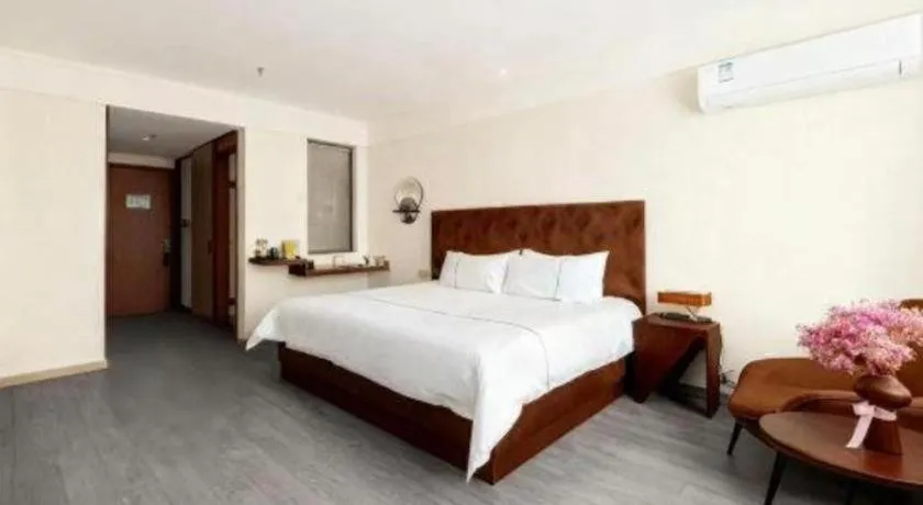 Bed in Magnotel Hotel Huizhou South Station Branch