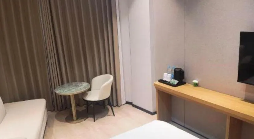 Bed in Magnotel Hotel Huizhou South Station Branch