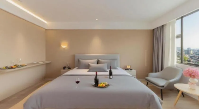 Bed in Magnotel Hotel Huizhou South Station Branch