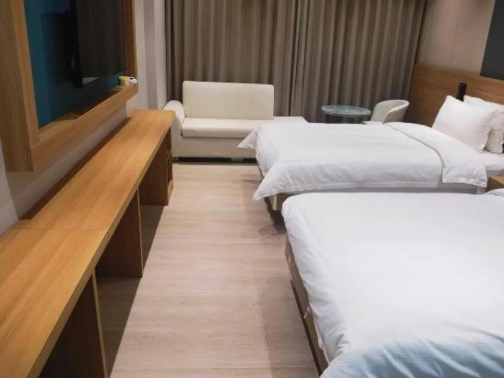 Bed in Magnotel Hotel Huizhou South Station Branch