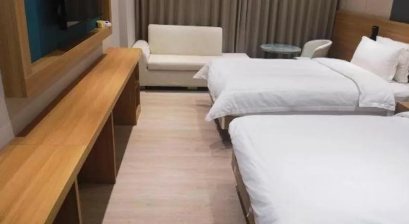 Bed in Magnotel Hotel Huizhou South Station Branch