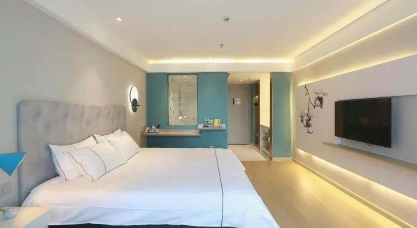 Bed in Magnotel Hotel Huizhou South Station Branch