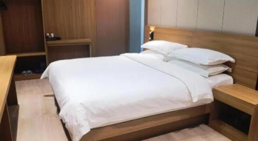 Bed in Magnotel Hotel Huizhou South Station Branch