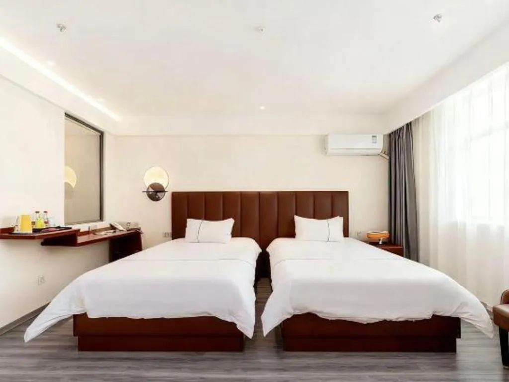 Bed in Magnotel Hotel Huizhou South Station Branch